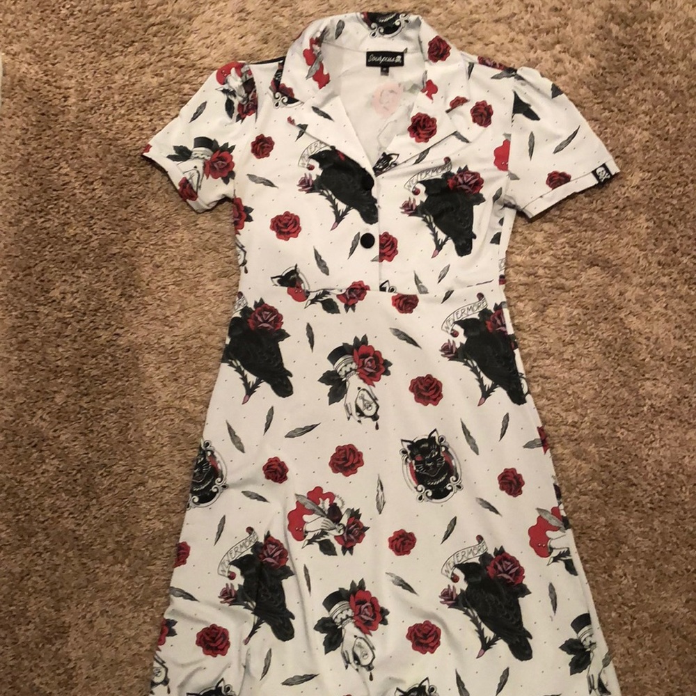 Sourpuss dress with Poe theme